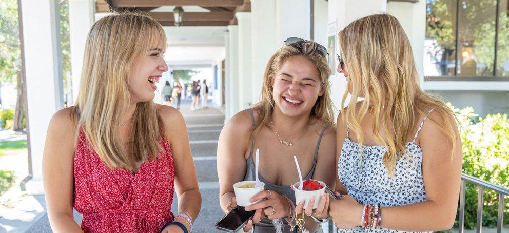 three students eating ice cream